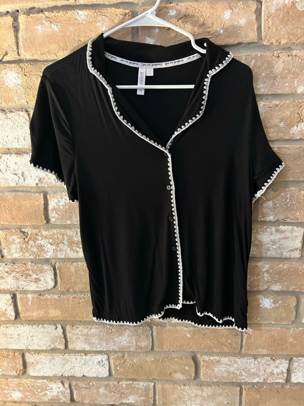 Black Short-Sleeve Button Front Top with White Ruffle Trim
